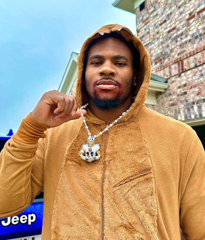 Micah Parsons custom chain and lion costume